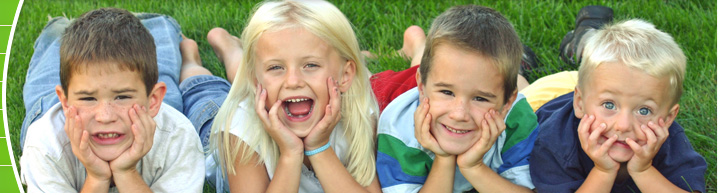photo of kids in grass